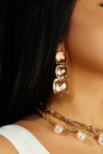 Load image into Gallery viewer, model wearing clear statement dangle earrings