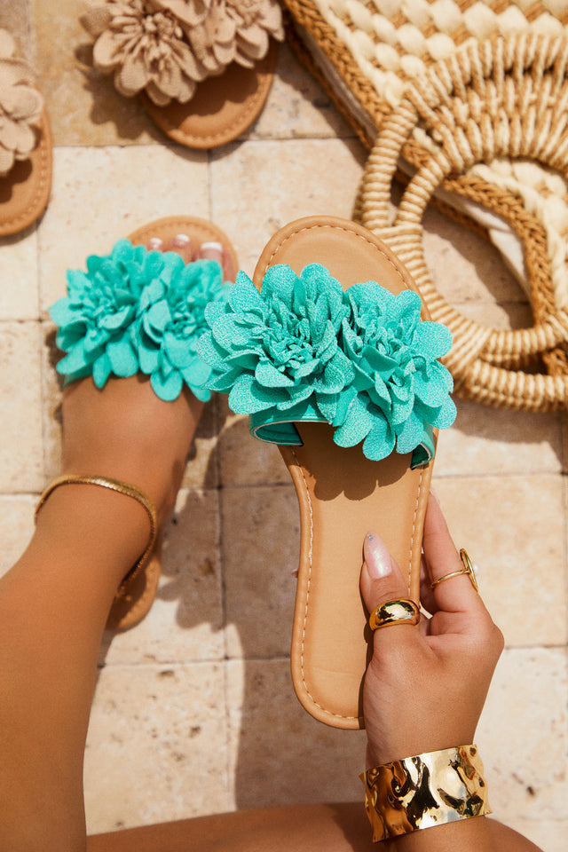 Load image into Gallery viewer, Turquoise Flower Slip On Sandals Held By Female Model