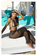 Load image into Gallery viewer, Girl Sitting in a Cabana Wearing Black Swim with Black Fishnet Pant