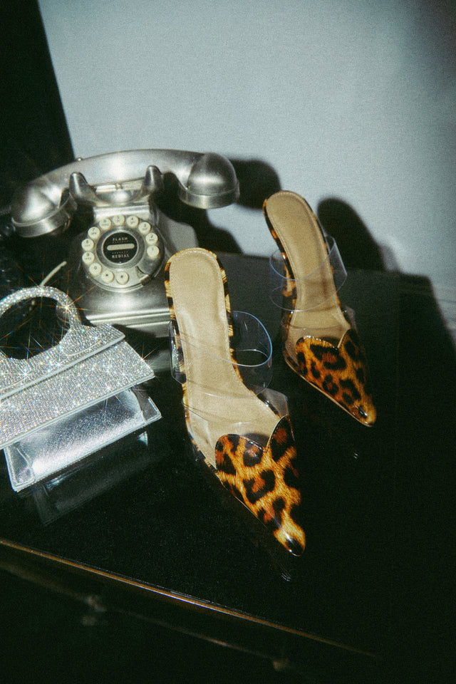 Load image into Gallery viewer, Leopard Pointed To Mules with Clear Straps On Table