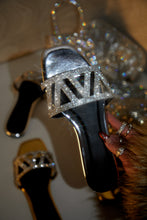 Load image into Gallery viewer, Women Holding Silver-Tone Sandals