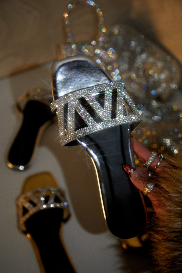 Load image into Gallery viewer, Women Holding Silver-Tone Sandals