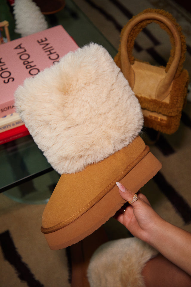 Load image into Gallery viewer, Model Holding Tan Faux Fur Boot
