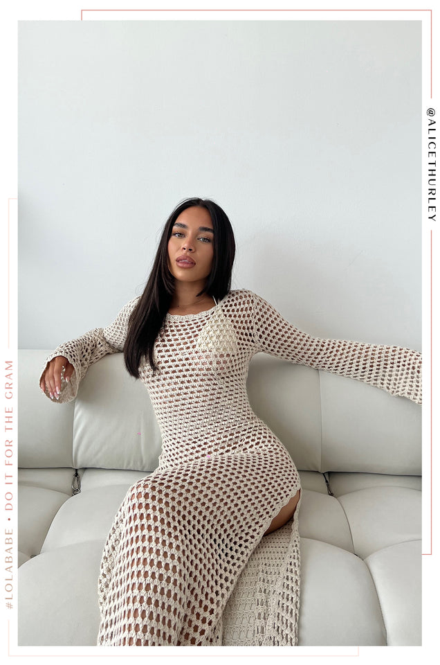 Load image into Gallery viewer, Girl Sitting Wearing Crochet Long Sleeve Dress with Side Slit
