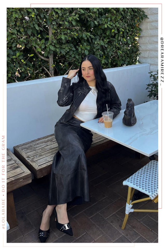 Load image into Gallery viewer, Girl Sitting Wearing Black Distressed Jacket
