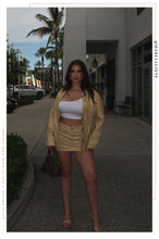 Load image into Gallery viewer, Tiani PU Mini Skirt - Butter
