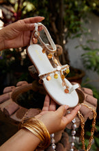 Load image into Gallery viewer, Women Holding White Sandals
