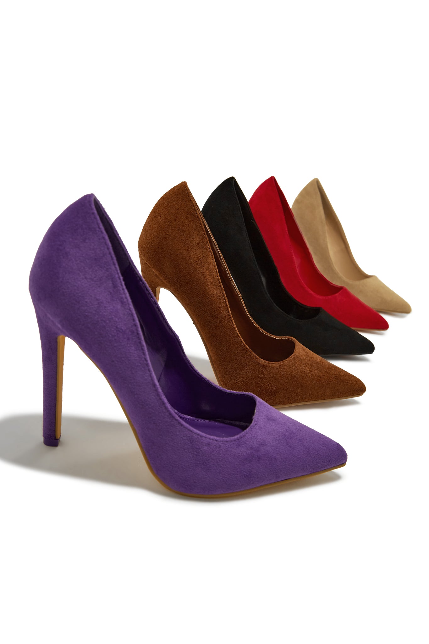 Premium Photo | Female purple shoes over white