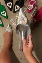 Load image into Gallery viewer, Women Holding Silver-Tone Flats
