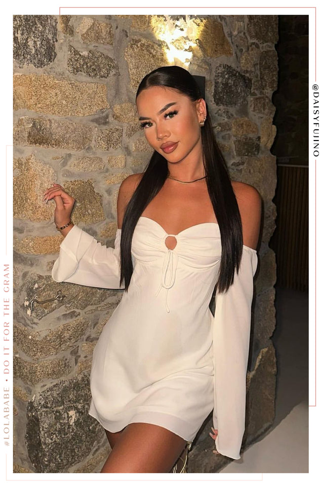 Load image into Gallery viewer, Women Standing Wearing Ivory Off The Shoulder Mini Dress
