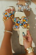 Load image into Gallery viewer, Women Holding Gold-Tone Slip On Sandals with Multi-Color Embellished Detailing
