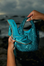Load image into Gallery viewer, Women Holding Blue Heels and Blue Bag
