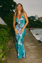 Load image into Gallery viewer, Model Wearing Blue Maxi Dress by the Beach
