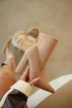 Load image into Gallery viewer, Nude Ankle Boot Held By Model
