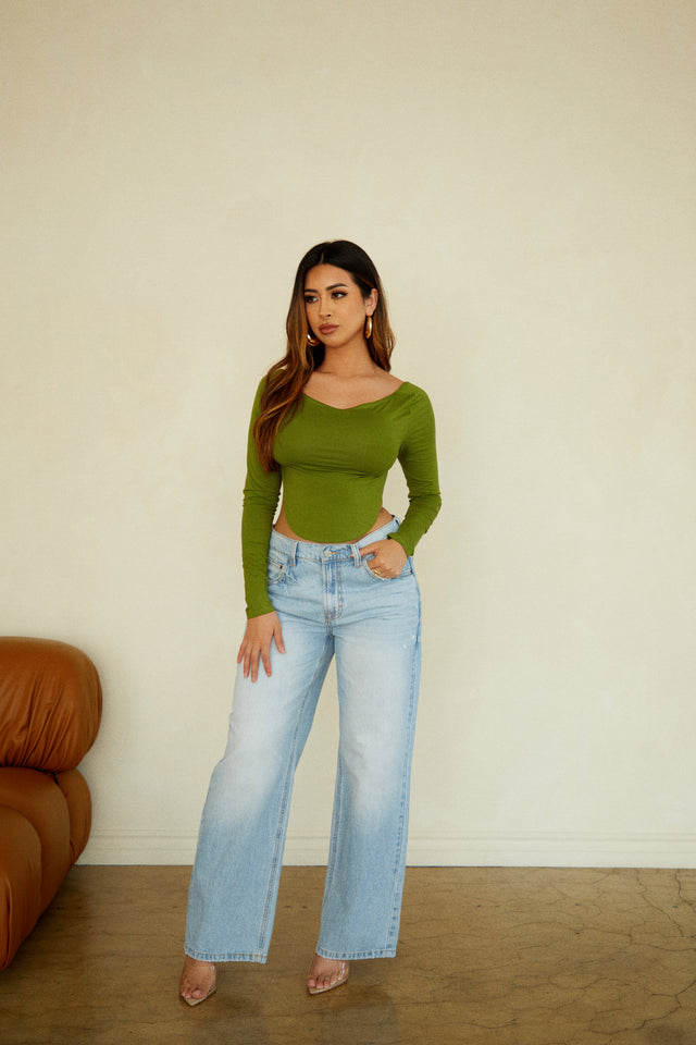Load image into Gallery viewer, Model Wearing Green Top with Denim Pant
