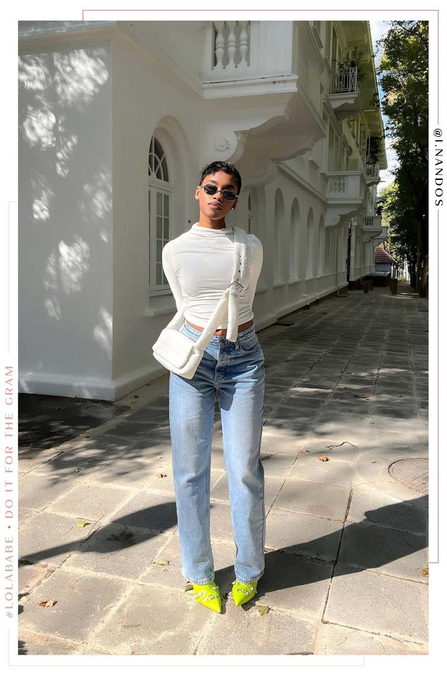 Load image into Gallery viewer, Girl Standing On Street Wearing White Long Sleeve Top with Denim Jeans
