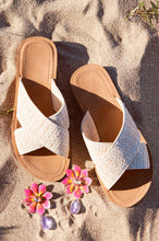 Load image into Gallery viewer, Straw Slip On Sandals Laying On Sand
