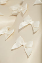 Load image into Gallery viewer, Cream Bow Tie Boots
