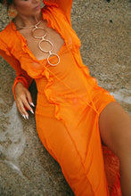 Load image into Gallery viewer, Model Laying On The Beach Wearing Orange Mesh Maxi Dress
