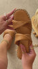 Video of tan slip on sandals