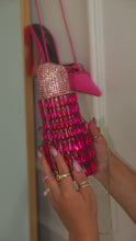 Load and play video in Gallery viewer, Video of embellished lipstick shape bag
