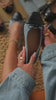 Video of denim bow flats with black toe