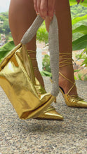 Load and play video in Gallery viewer, model wearing gold tone lace up heels video
