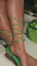 Load and play video in Gallery viewer, Video of model wearing green embellished lace up sandals
