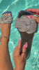 Silver embellished slip on sandals video by the pool