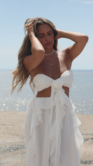 Video of model wearing ruffle maxi dress
