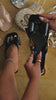 Video of black sandals with bow