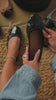 Video of black flats with bow