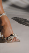 Load and play video in Gallery viewer, Video of silver clear embellished high heels
