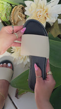Load and play video in Gallery viewer, black and white slip on sandal

