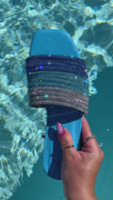 Load and play video in Gallery viewer, Video of model holding Blue Embellished Slip On Sandals
