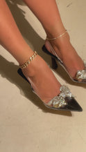 Load and play video in Gallery viewer, Model wearing black single sole pumps
