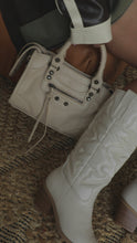 Load and play video in Gallery viewer, Video of white cowgirl boots on model
