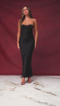 Load and play video in Gallery viewer, Video of black satin maxi dress on model
