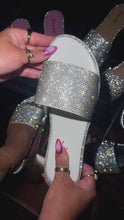 Load and play video in Gallery viewer, Video of white embellished slip on sandals
