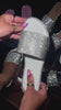 Video of white embellished slip on sandals
