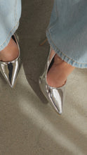 Load and play video in Gallery viewer, Model wearing silver pumps video
