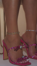 Load and play video in Gallery viewer, pink heels with embellished bow straps on model video
