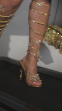 Load and play video in Gallery viewer, Model walking in gold butterfly embellished heels
