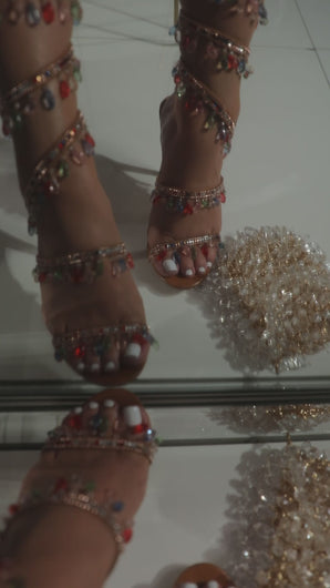 Video of tan embellished coil heel