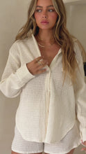 Load and play video in Gallery viewer, Cream crinkled shirt on model video
