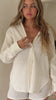 Cream crinkled shirt on model video