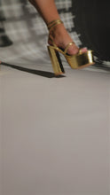 Load and play video in Gallery viewer, gold tone platform heels video

