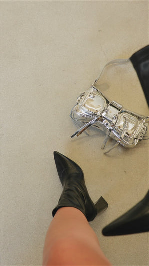 Black pointed toe boots