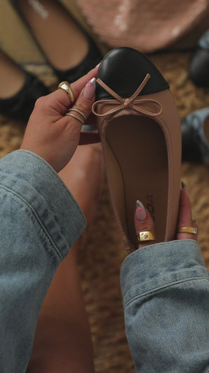 Video of nude flats with bows & black toe 
