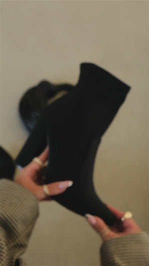 Video of black chunky heel booties